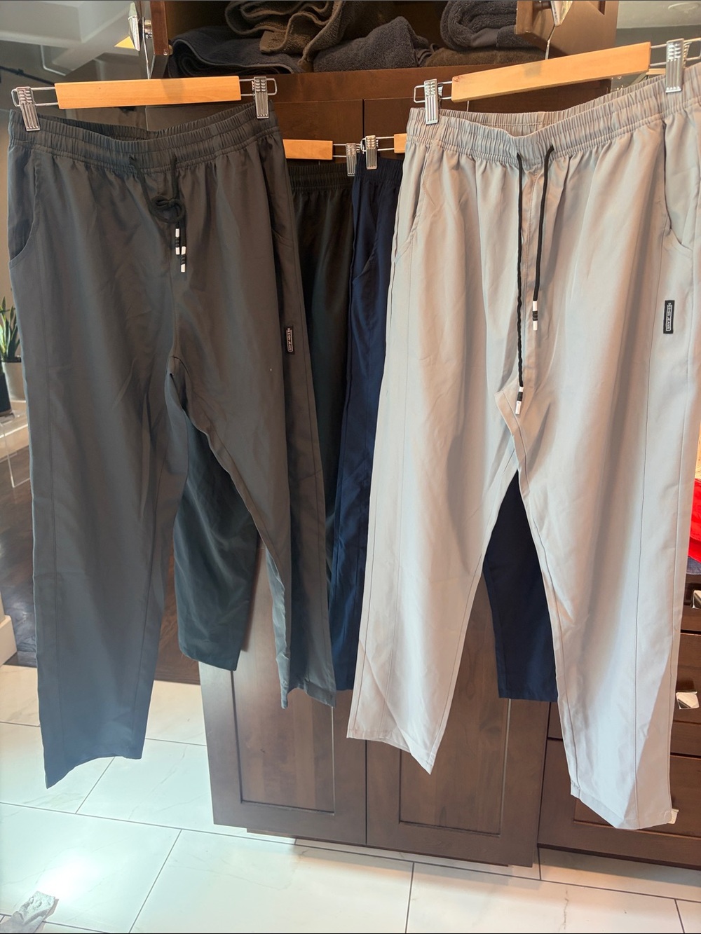 Set of Four Men's Pants in Black, Gray, and Light Gray